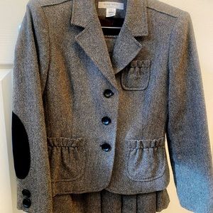 Classic Nine West suit with ruffled pleated skirt, and ruffled pockets.